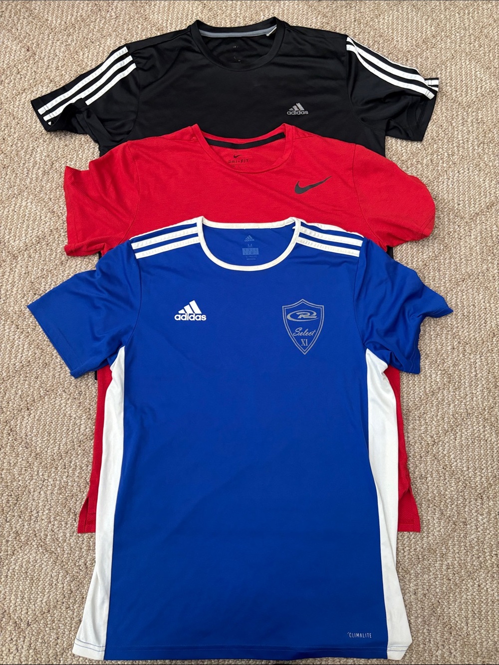 Size Medium Athletic bundle. 2 Adidas 1 Nike
